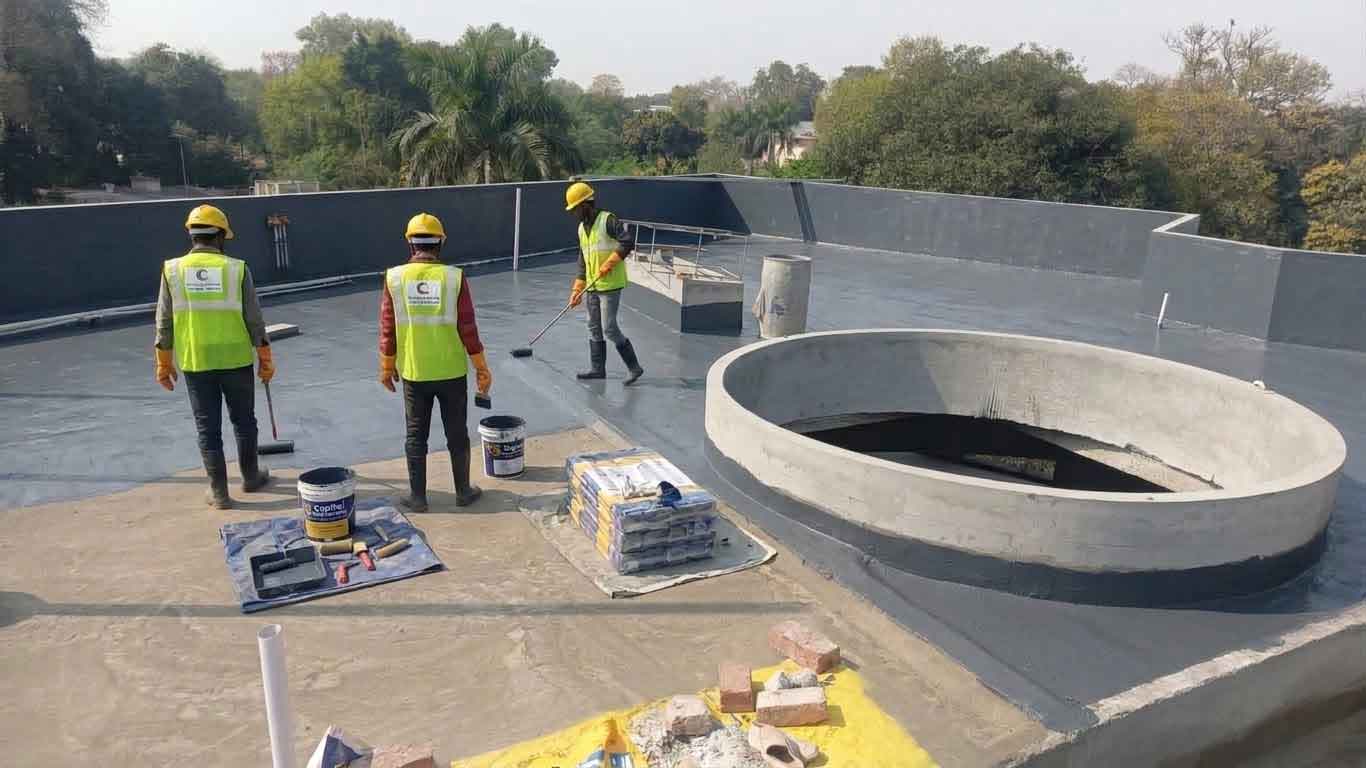 Capital Waterproofing team at work in Lahore